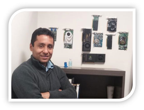 Diego displays multiple generations of GPUs in his office at Hologic