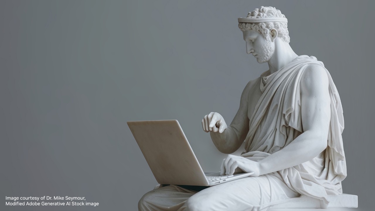 A statue using a laptop