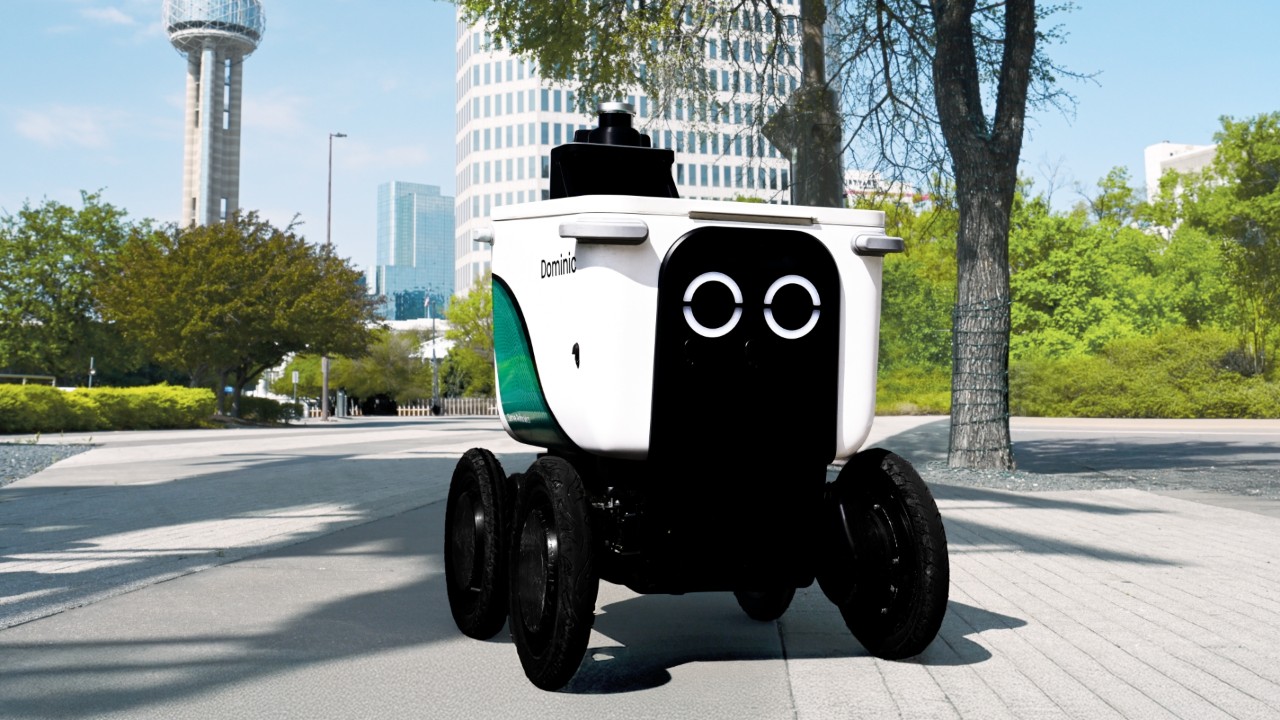 Serve Robotics delivery robot on a sunny street in an urban setting