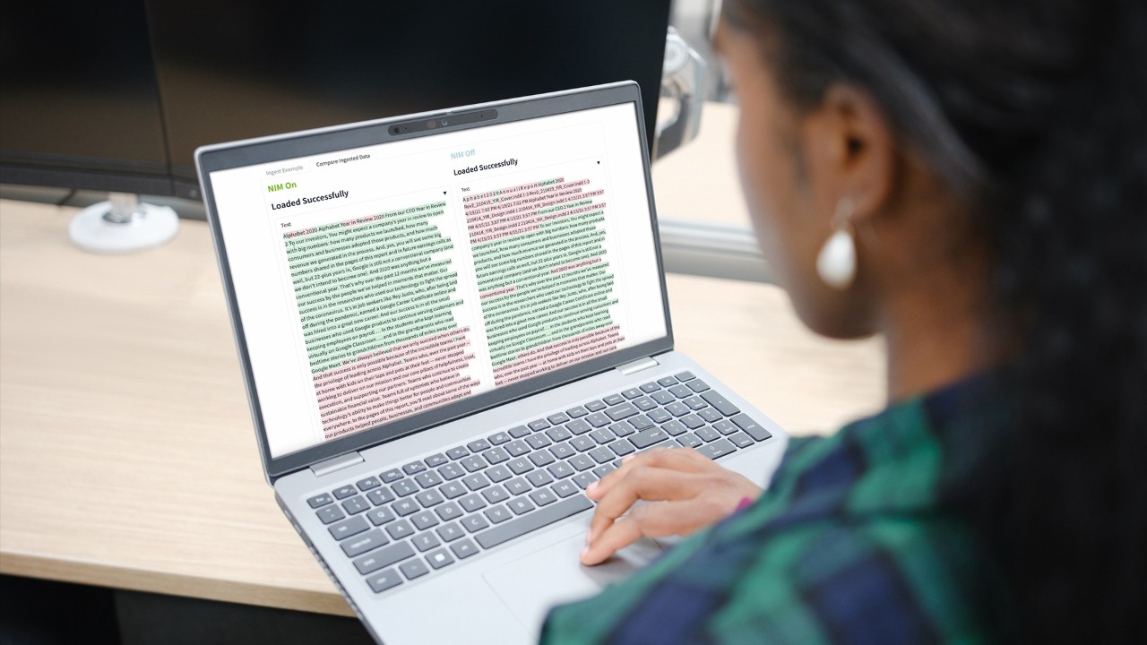An image of a human using a laptop generating data using retrieval-augmented generation using NVIDIA NIM.