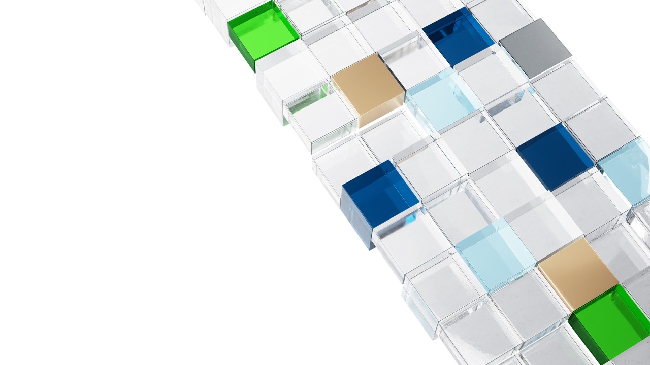 A diagonal arrangement of transparent and solid-colored 3D cubes on a white background