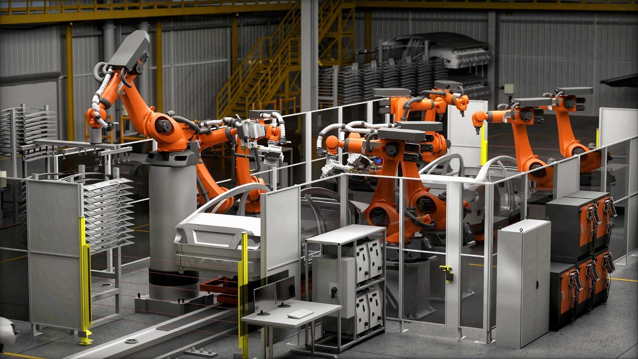 An image displays several orange robotic arms on an assembly line in a factory setting, representing an industrial facility digital twin.