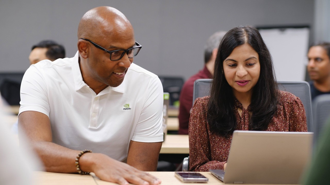  A student is learning about AI development from an NVIDIA expert