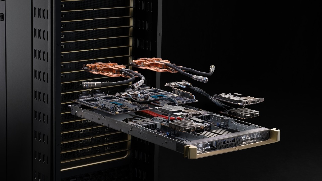 The image shows an exploded view of an MGX Rack and compute node, highlighting compute, cooling, networking and system components required for high-density AI Factories.